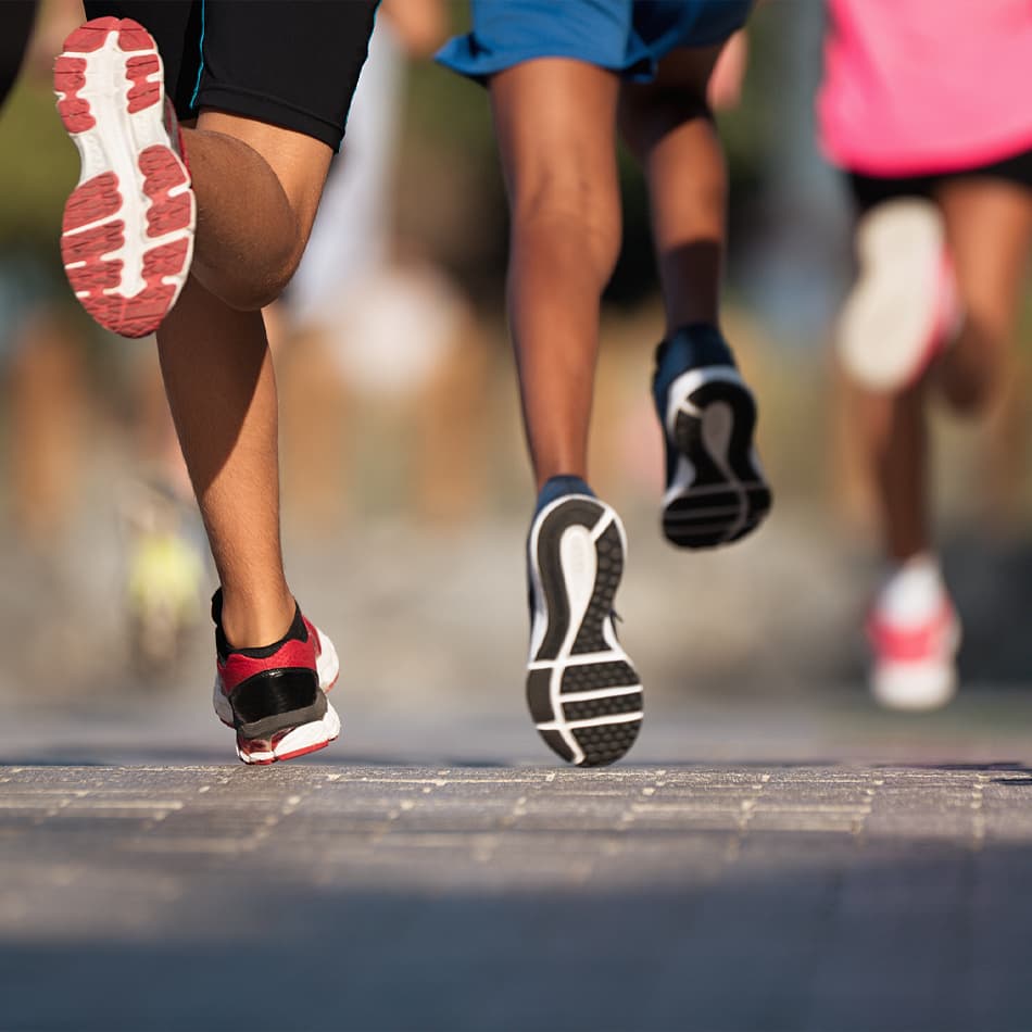 Runners’ feet on a road